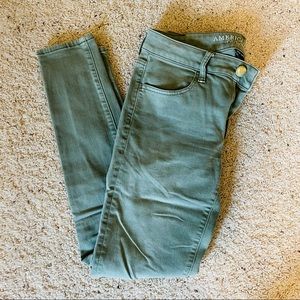 American Eagle green skinny jeans